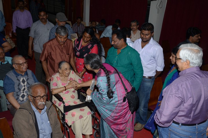 Smt. Arati Sinha feeling elated when greeted by Smt. Asha Jayakumar, both being photographers